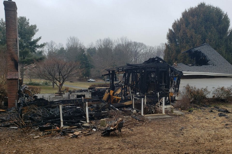 home with severe fire damage side